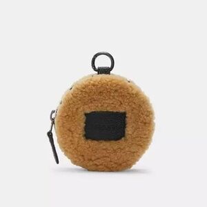 COACH genuine shearling and leather round coin case
